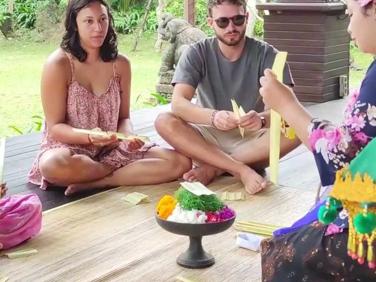 Guests learning to make canang sari offerings