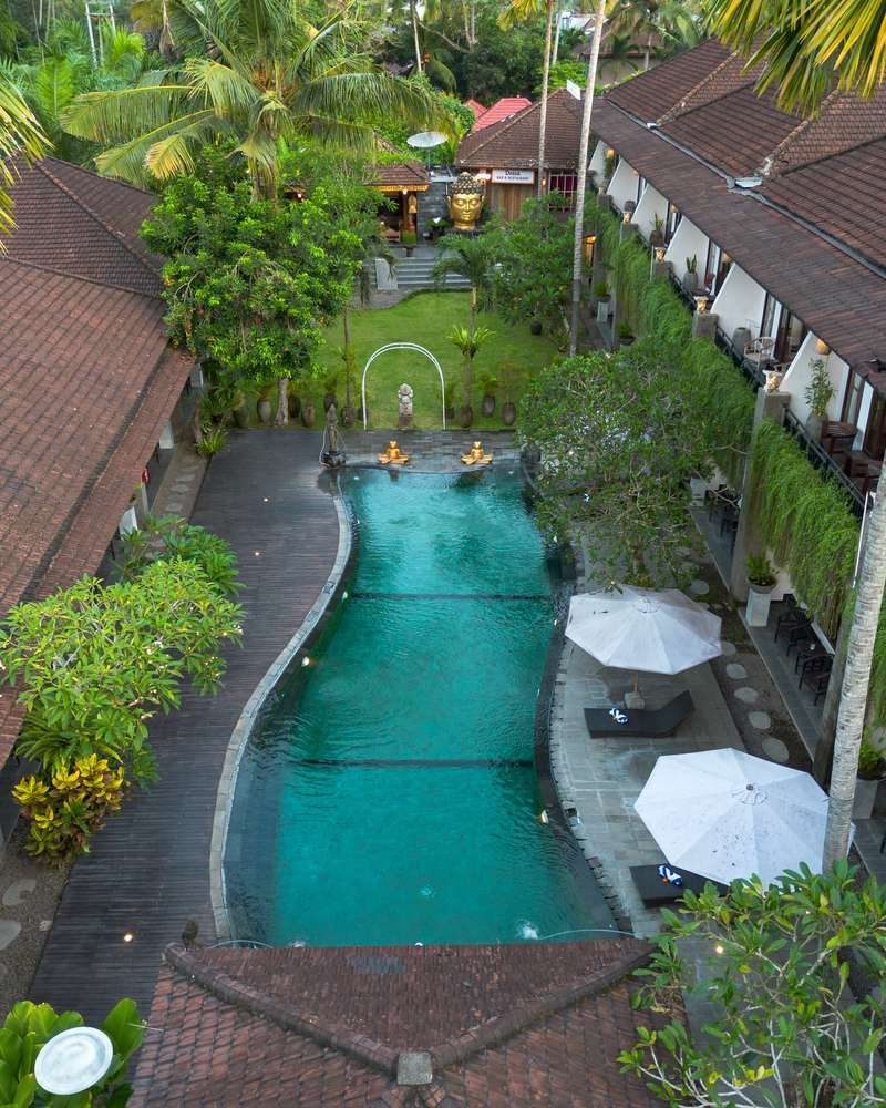 Aerial photograph of the Ubud Raya Boutique Hotel courtyard, pool and gardens