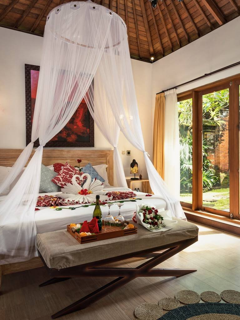 The bedroom: King-size canopy bed, cool and quiet