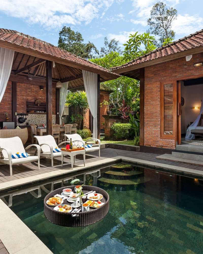 Floating breakfast tray in the private pool of the Three-Bedroom Pool Villa